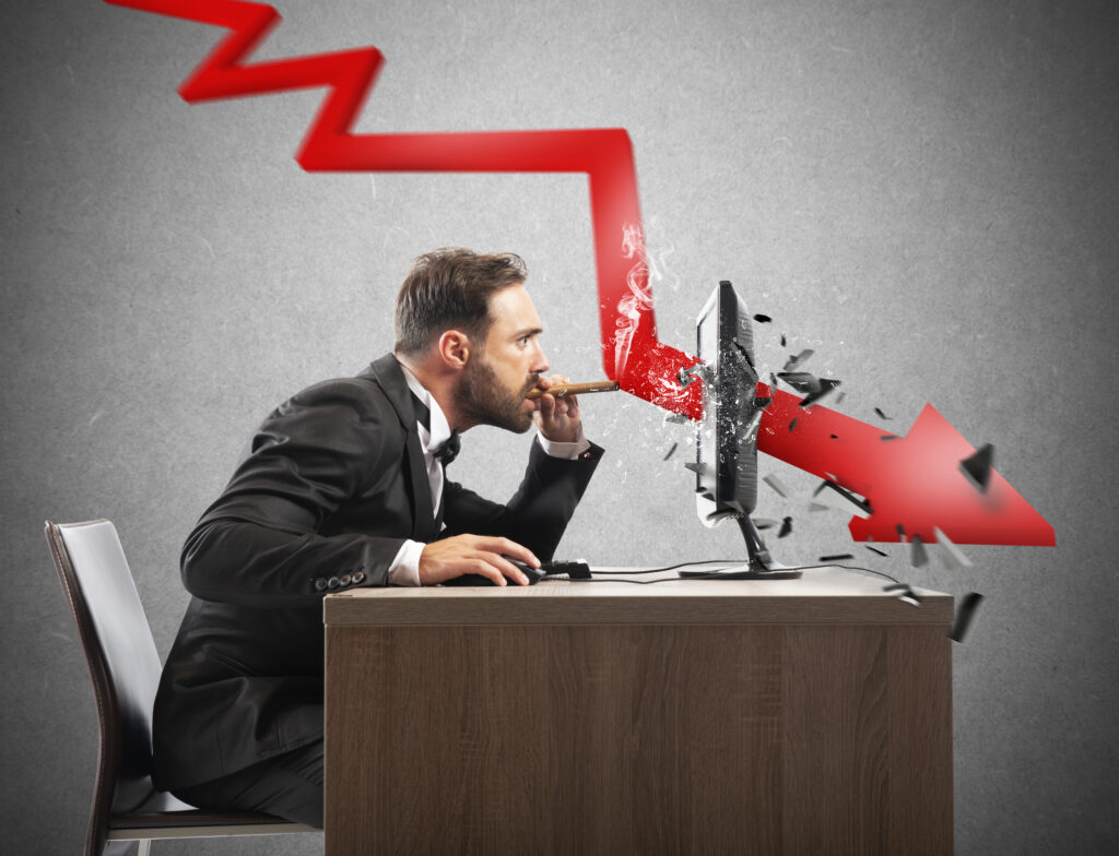 businessman look the negative report of his company. a red arrow breaks the screen Biggest Marketing Mistakes Business Owners Make That Kill ROI